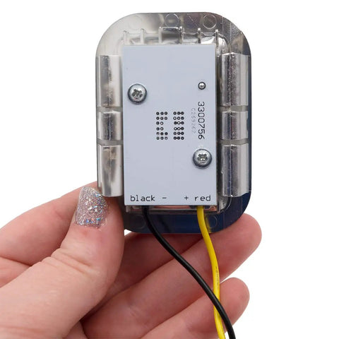Hand holding Refrigerator LED Light Module Replacement For Specific Models W11205082 And W11683244 With Chrome Bezel, Wired In Series