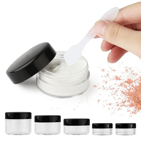 10 Piece Clear Acrylic Makeup Travel Jars With Lids In 0.11 Oz 0.18 Oz 0.35 Oz 0.53 Oz And 0.7 Oz Sizes Plus 5 Mini Spatulas For On The Go Storage And Gift Random Color Set with open jar and spatula.