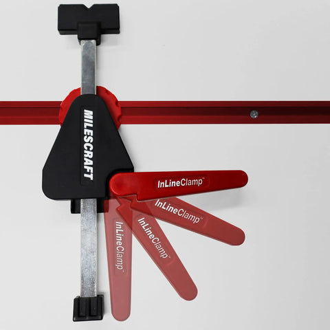 Inline Clamps T Track Clamp Two Pack With Cam Stops for Woodworking, attached to a T-track, showcasing adjustable red clamp levers.