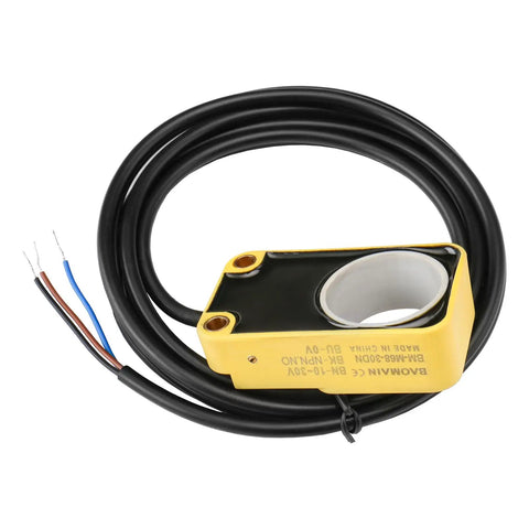Ring Proximity Sensor 30mm Diameter, NPN Normally Open, 10 To 30V DC, 15mA Draw, 100mA Load, Detects Iron And Steel with cables.