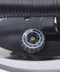 Close-up of the temperature control dial on the Professional Grade Industrial Steam Iron Featuring Quick Temp Toggle.