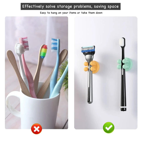 Four Pack Self Adhesive Silicone Toothbrush Holders Wall Mounted Mirror Hooks For Shower Bathroom Kitchen Living Room Office Waterproof Towel Hangers No Drill Peel And Stick Installation displayed with toothbrushes and razor.