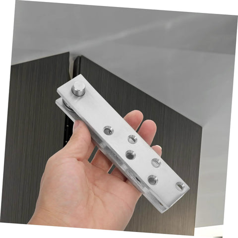 Person holding Hidden Door Pivot Hinge System For Secret Bookcase Doors, 360 Degree Stainless Steel Concealed Hinge.
