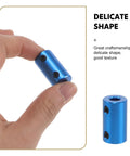 Close up of a blue aluminum motor shaft coupling connector, 6mm, showcasing craftsmanship, for 3D printers and CNC machines.