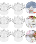 12 Pack Plastic Candy Packaging Boxes With Lids For Sweets And Snacks, displayed on event tables, crown-shaped lids