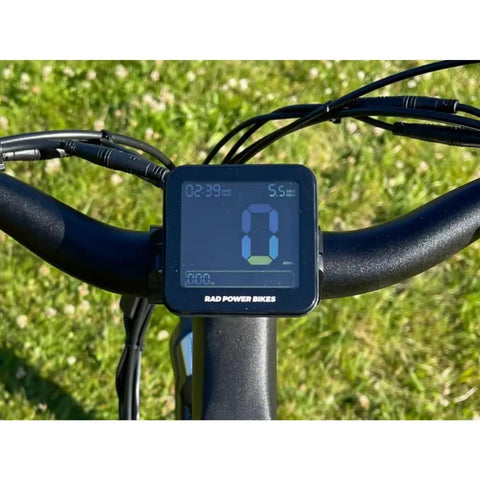 48V Ebike Display Meter With Cycling Computer And Speed Control Panel mounted on bike handlebar