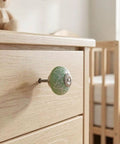 Top Shelf Vintage Floral Ceramic Cabinet Knobs And Drawer Pulls Set To Freshen Your Space With A Darn Cute 40mm Round Design on a dresser.