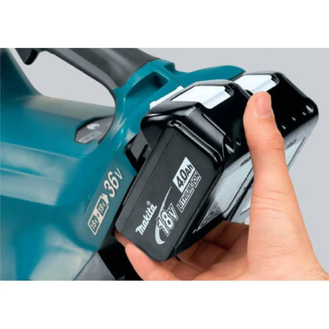 No Nonsense 36V Brushless Cordless Leaf Blower With Beast Mode Airflow, showing 18V battery being inserted.