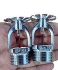 Quick Response Pendent Fire Sprinkler Head 155F Chrome Brass Half Inch Red Glass Bulb on a hand showing details.