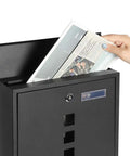 Person inserting newspaper into Stainless Steel Mailbox With Key Lock Wall Mounted Large Capacity Mailbox With Newspaper Compartment