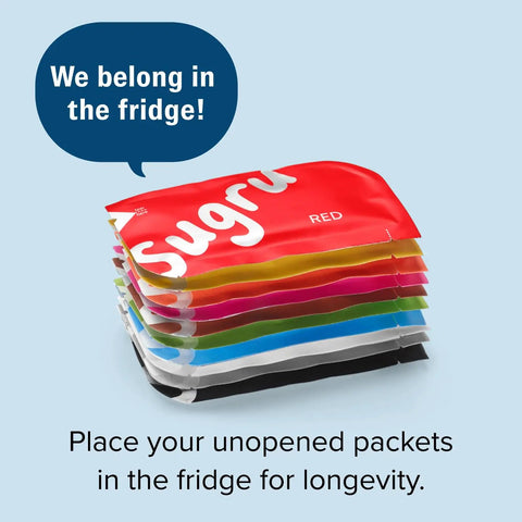 Stack of colorful unopened packets with text 'We belong in the fridge,' related to Moldable Silicone Glue For Crafts And Diy Home Fixes Waterproof All Purpose Putty Removable Kid Safe Indoor Outdoor 8 Pack Black White Gray 3.5g Each Great For Repairs And Craft Projects At Home And On The Go for storage instruction.