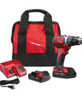Badass Compact Cordless Drill Driver Kit featuring brushed motor and high torque performance with charger and battery in red bag.