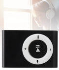 Close-up of black Clip On MP3 Player With USB Cable And Earphones Ultra Lightweight Portable Music Player For Running And Hiking