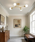 Room with modern decor and ceiling light; not the Black Sputnik Chandelier 12 Lights Modern Metal Semi Flush Mount Ceiling Light Fixture.