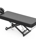 Paddie Flat Electric Lift Massage Table Professional Spa Bed With 6.7 Inch Memory Foam, black cushioned surface, adjustable face cradle.