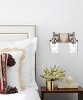 4 Light Brushed Nickel Bathroom Vanity Light Over Mirror With Clear Glass Shades in modern bedroom setting