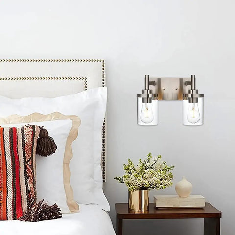 4 Light Brushed Nickel Bathroom Vanity Light Over Mirror With Clear Glass Shades in modern bedroom setting