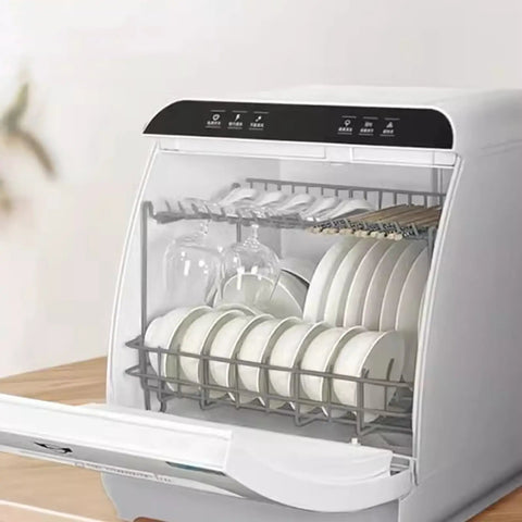 Installation Free Compact Desktop Dishwasher With Slick Pull Out Tray And Heavy Duty Triple Filter Zero Plumbing Drama, loaded with plates and glasses.