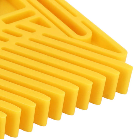 Close-up of yellow Adjustable Featherboard For Table Saw And Router Table Abs Woodworking Safety Lock 2 Piece Set with ridged surface.