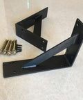 Heavy Duty Wall Mounted Shelf Brackets With Bullet Proof Triangular Steel Frame For Countertops And Floating Shelves Rust Resistant Matte Black Finish Hella Sturdy 800 Pound Load Rating Pair with screws.