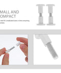 Close-up of 50 White Wood Panel Fasteners And Connector Bolts Kit For Cabinet And Tabletop Assembly, fingers holding hardware.