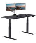 Vari ComfortEdge Electric Standing Desk 60X30 Black Dual Motor Height Adjustable Sit Stand Workstation with dual monitors and keyboard.