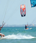 Person enjoying kite surfing on ocean, showcasing the excitement of saltwater adventures using floating nylon marine rope with hook.