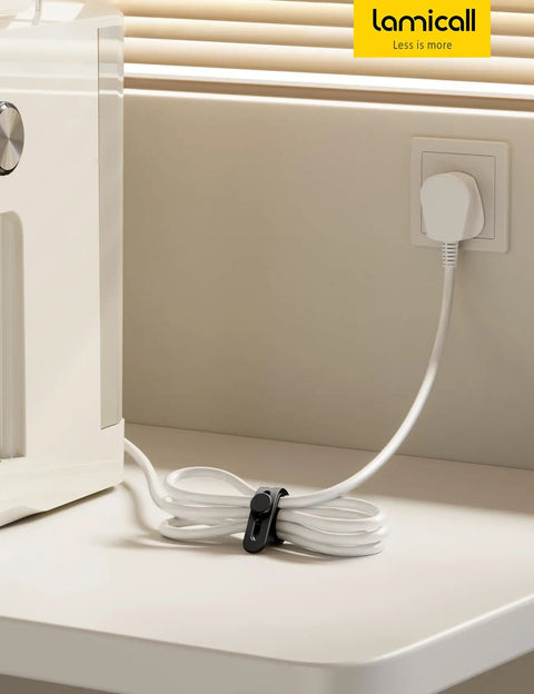 Silicone Cable Ties 10 Pack Cord Organizer with Secure Lock Buckle in use, managing cables on a tabletop, near an outlet.
