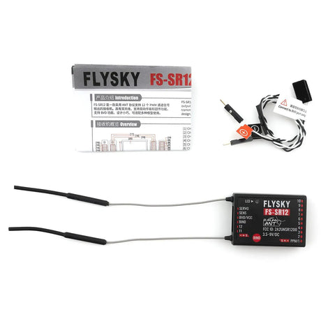 Flysky FS-SR12 Receiver 2.4GHz 12CH ANT Protocol with dual antennas for RC planes, helis, drones, and cars, shown with manual.