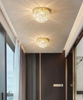 Lit French Gold Crystal Chandelier Ceiling Light 16 Inch Semi Flush Mount with five lights, three-tier design in modern room setting.