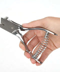 Hand holding Tough As Nails Heavy Duty Handheld Hole Punch For ID Cards And Plastic PVC Cardstock Cardboard Built With Zinc Alloy