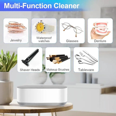 Multi-function cleaner for jewelry, glasses, dentures, and tableware on a wooden table, emphasizing versatility and convenience.