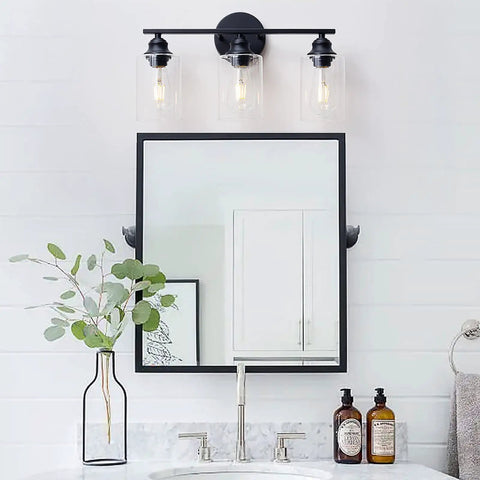 Black 3 Light Vanity Light Fixture Set With Clear Glass Shades Modern Farmhouse Bathroom Lighting Over Mirror sleek design