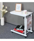 No Stress Rolling Laptop Desk And Mobile Workstation Stand Adjustable Tilt Table with white finish and magazines storage.