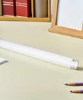 4 Pack Plastic Poster Mailing Tubes With Sealed Caps For Easy Storage And Transport 3.5cm Diameter And 31cm Length on desk