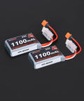 Two Beefy 2S 1100mAh LiPo Batteries with EC2 Female to IC2 Male Plug on black background