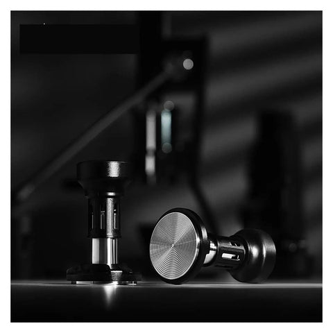 58mm Dosing Funnel And Coffee Distributor For Espresso Portafilter Holder With Adjustable Stainless Steel Tamper and Bottomless Stand shown in black with metallic accents.