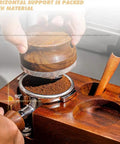Close-up of Kickass Espresso Organizer And Height Adjustable Tamping Station for 51mm 54mm And 58mm Portafilters with solid wood and tamping tool in use.