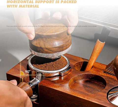 Close-up of Kickass Espresso Organizer And Height Adjustable Tamping Station for 51mm 54mm And 58mm Portafilters with solid wood and tamping tool in use.