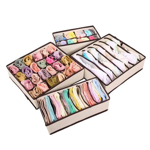 Top Tier Nonwoven Bra And Underwear Storage Boxes Four Piece Set, beige bins holding rolled socks and lingerie.