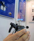 Mini Butane Burner Portable Gas Stove With Aluminum Rack For Outdoor Camping And Home Science Experiments in hand