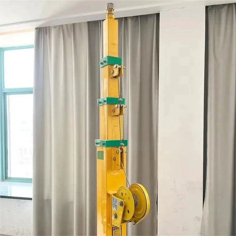 Manual Push Up Telescopic Mast 3 To 9 Meter Range Aluminum Alloy Construction, showing the mast with pulley indoors.