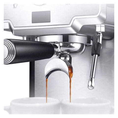 Close-up of Home 15 Bar Espresso Machine With Semi Automatic Pump CRM3605 Milk Frother dispensing espresso into cups.