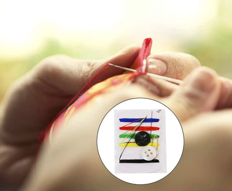 Close-up of hands using On The Go Travel Sewing Kit For Quick Fixes With Needles Threads Buttons And Safety Pin Emergency Repair Set