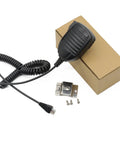 Handheld Shoulder Microphone For Yaesu And Vertex Radios With Durable Mic Hanger next to brown box and mounting hardware.