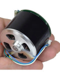 Cool 12V Brushless Motor With Big Neodymium Mag For Industrial Or DIY Work held in hand, showing compact size and wiring.