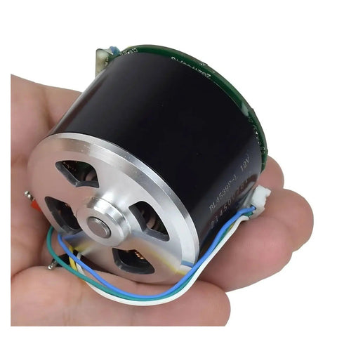 Cool 12V Brushless Motor With Big Neodymium Mag For Industrial Or DIY Work held in hand, showing compact size and wiring.