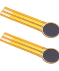 Two thin-film pressure sensors on yellow flex film with circular black sensing pads