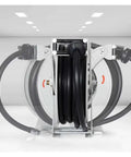 One Inch Heavy Duty Automatic Hose Reel Built Tough As Nails For Grip And Go Water Retrieval Plus Hassle Free Rolling Back On Any Job Site Setup, close-up of black hose coiled in metal frame.