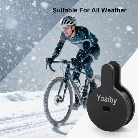 Cyclist riding in snow with High Performance Disc Brake Pads Kit For Bikes And Electric Scooters 4 Pairs in foreground